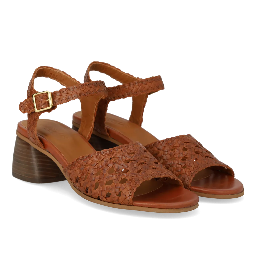 Hand-braided sandal with sculptural heel