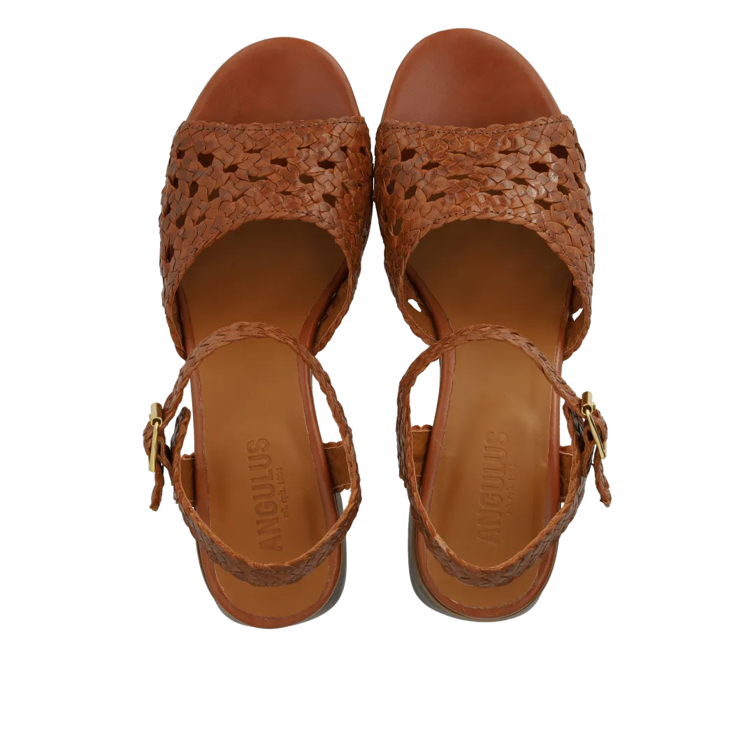 Hand-braided sandal with sculptural heel