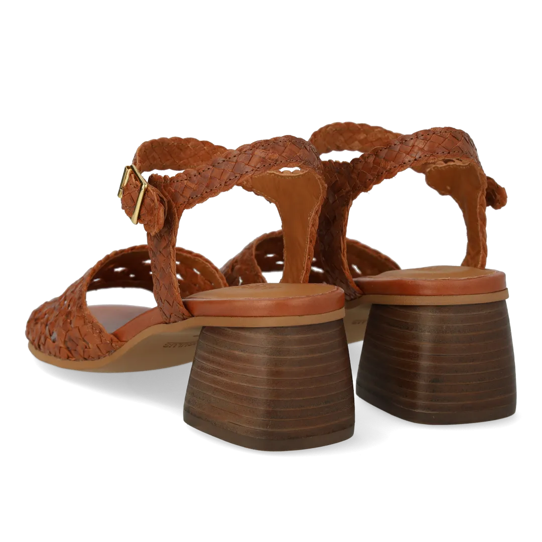Hand-braided sandal with sculptural heel